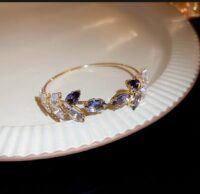Elegant Gold Bracelet with Purple Crystal | Premium Floral Design | Luxury Jewellery