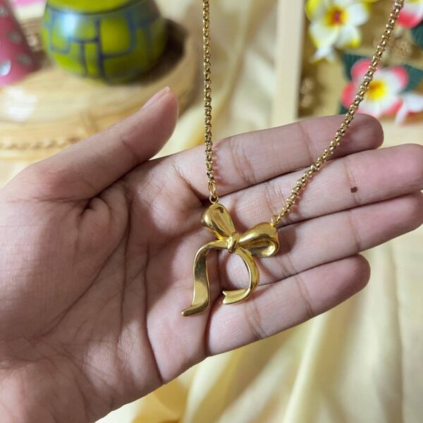 Golden Ribbon Initial Pendant Necklace – Elegant Statement Design
